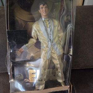 Gold Elvis Presley Collectible Doll